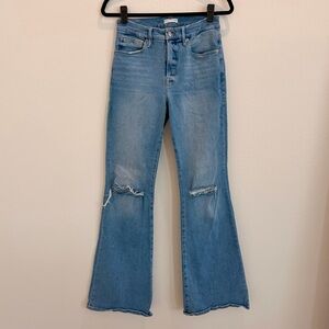 Good American Light Blue High-Rise Flare Jeans with Knee Rips